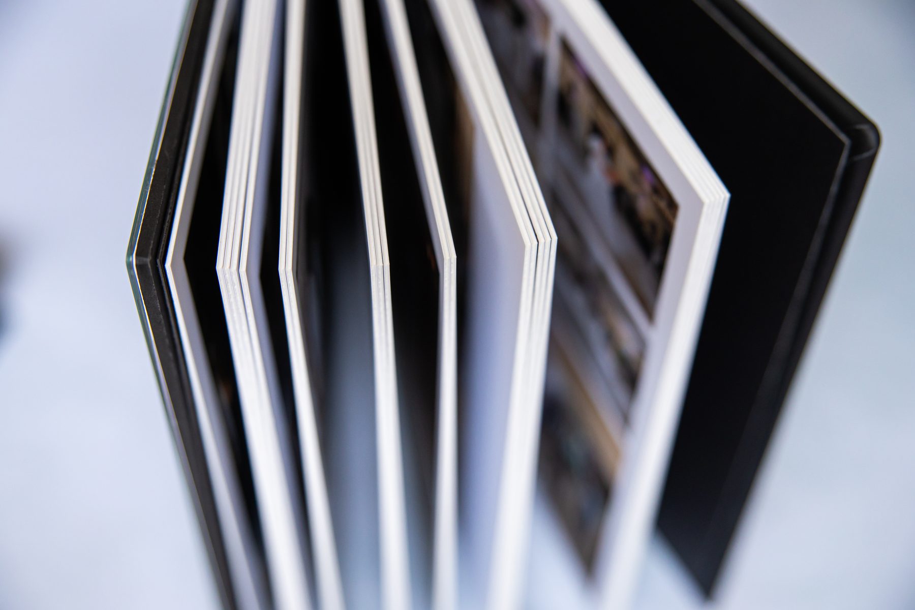 Wedding album pages fanned open
